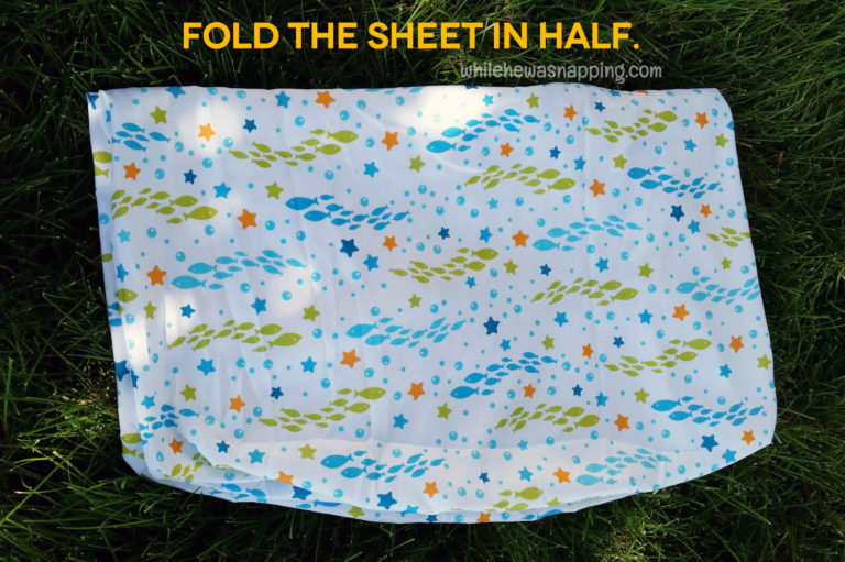 Folding a Fitted Sheet into a Roll While He Was Napping