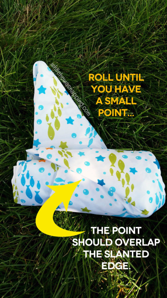 Folding a Fitted Sheet into a Roll While He Was Napping