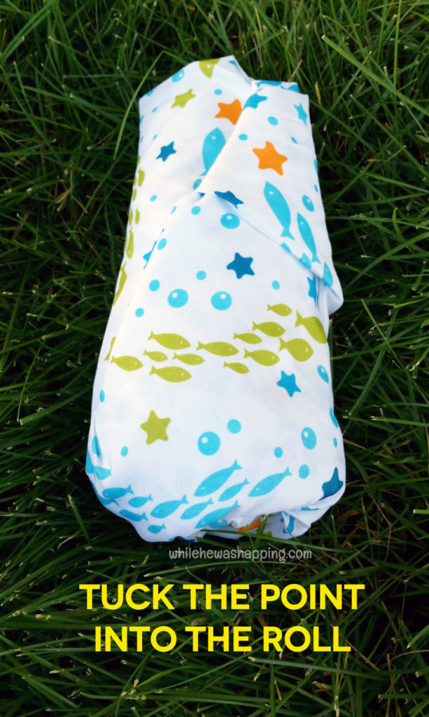 Folding a Fitted Sheet into a Roll While He Was Napping